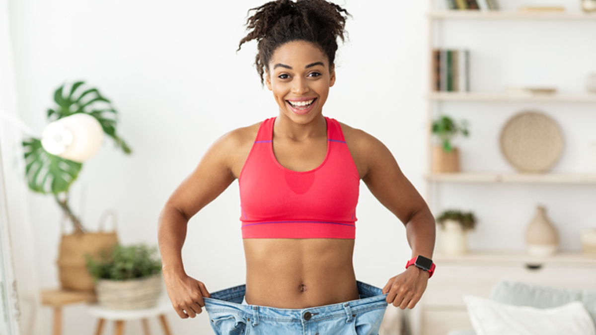 Mulher com expressão determinada representando a verdade sobre emagrecer e resultados reais